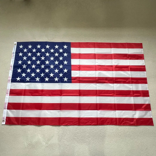 Stars and Stripes billowing in the wind, symbolizing freedom, perseverance, and the enduring American dream.